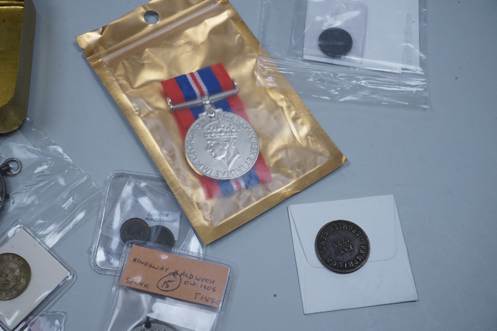 A QSA medal group miniature, comprising miniatures of; the Queen Victoria Golden Jubilee medal, the Queen’s South Africa medal with three clasps, the King’s South Africa medal with two clasps and the Africa General Servi